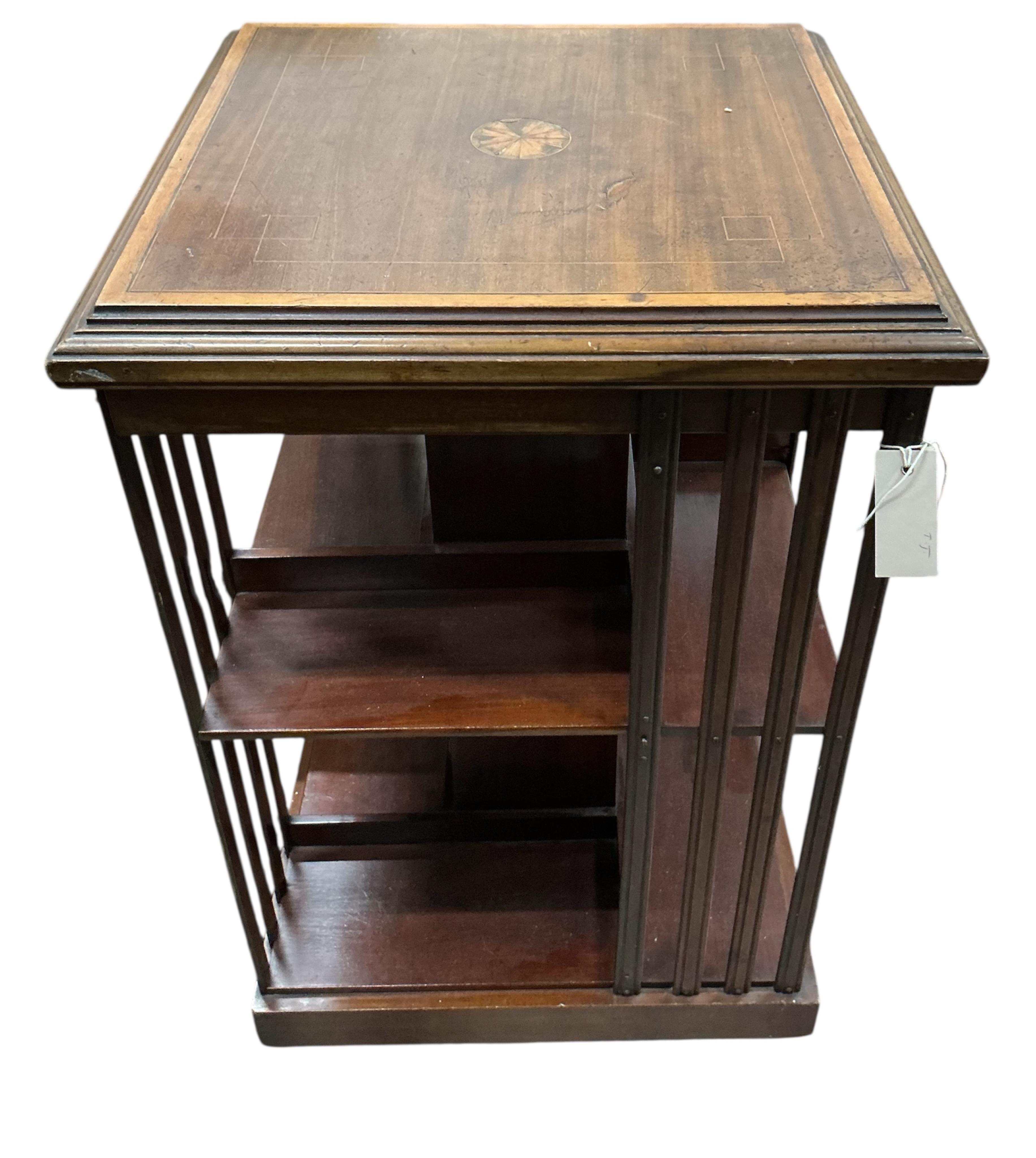 An Edwardian satinwood banded mahogany revolving bookcase, width 48cm, depth 48cm, height 89cm